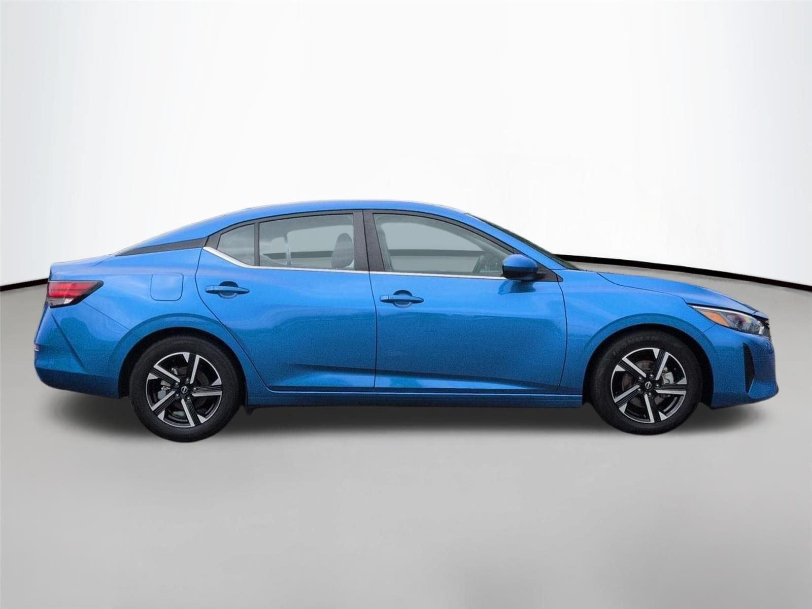 Used 2024 Electric Blue Metallic Nissan SV image 5