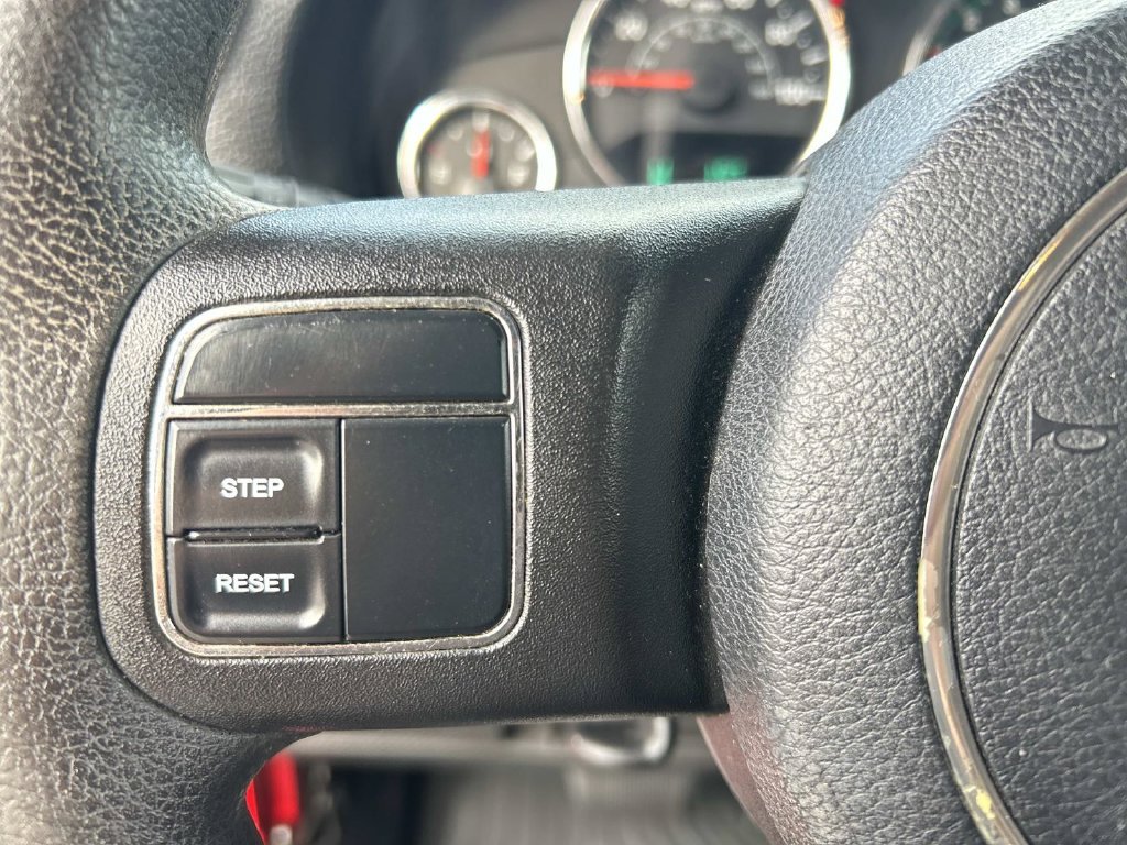 Used 2011 Flame Red Jeep Sport image 23