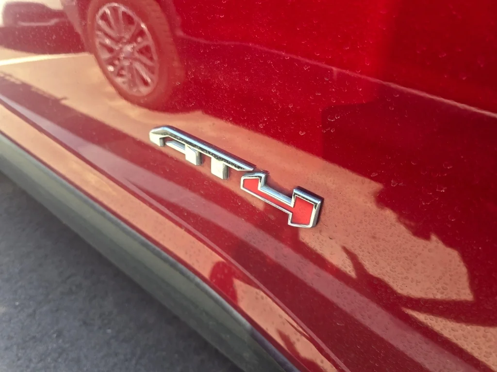 Used 2023 Volcanic Red Tintcoat GMC AT4 image 9