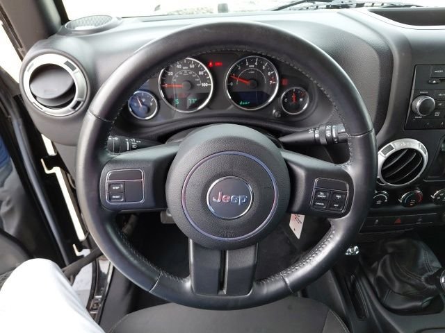 Used 2016 Black Clearcoat Jeep Sahara image 11