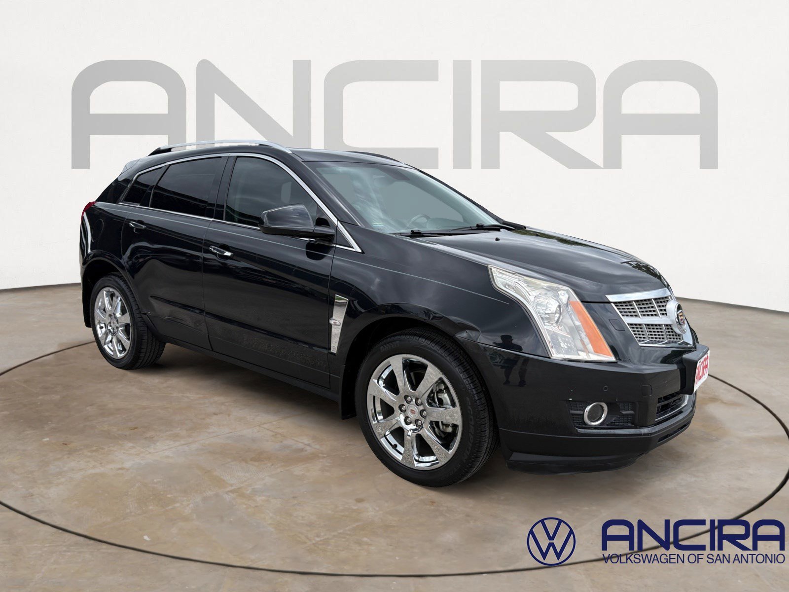 Used 2012 Black Ice Metallic Cadillac Performance Collection image 1