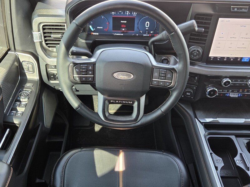 Used 2024 Black Metallic FORD PLATINUM 4WD CREW CAB 6.75