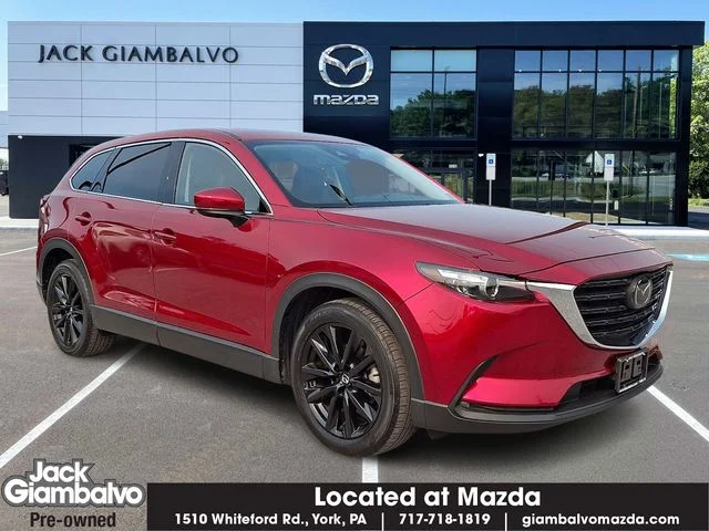 Used 2023 Red Mazda Touring Plus image 1