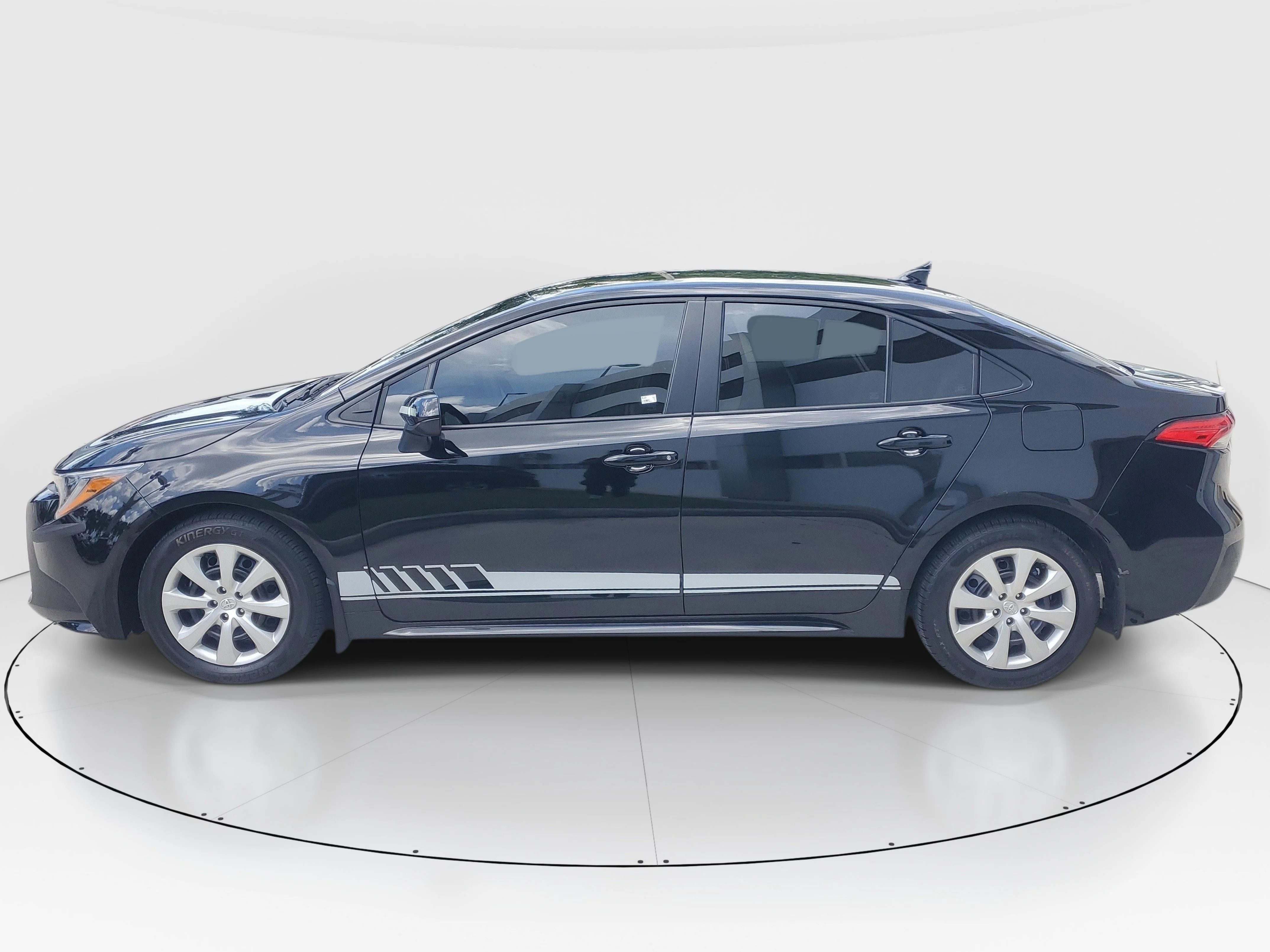 Used 2025 Midnight Black Metallic Toyota LE image 6