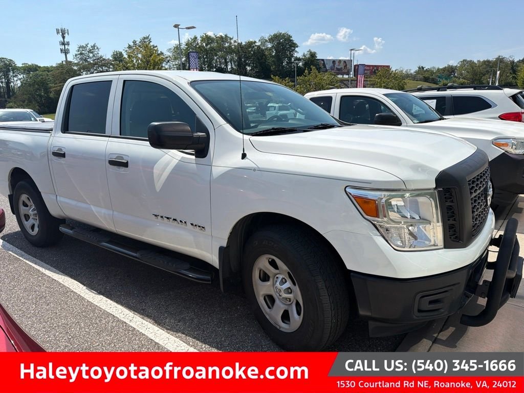 Used 2018 White Nissan S image 1