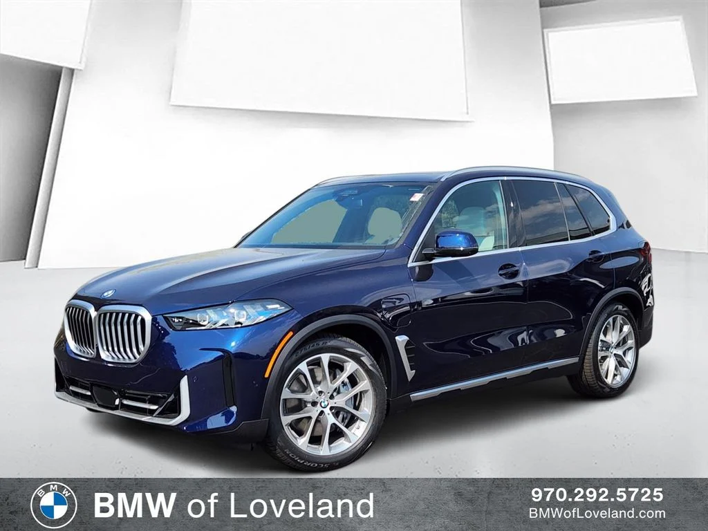 New 2026 Tanzanite Blue II Metallic BMW xDrive50e image 1