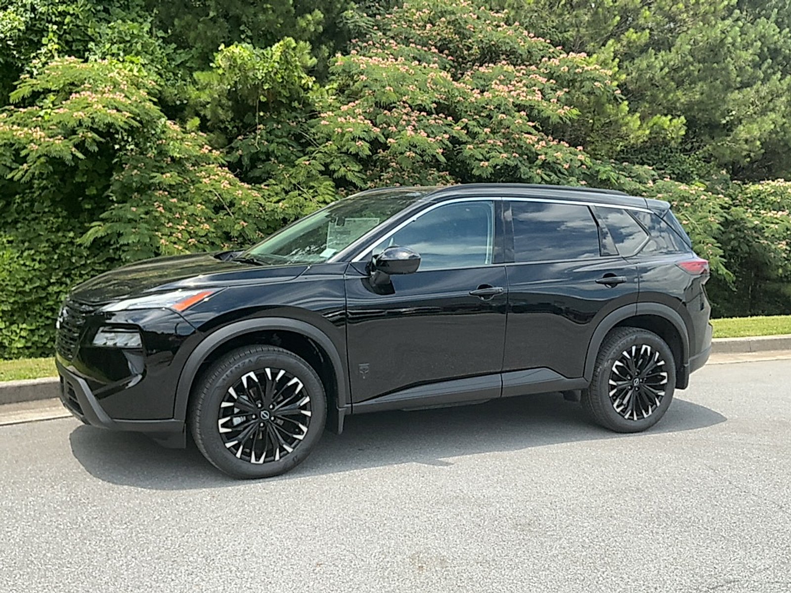 New 2026 Super Black Nissan Dark Armor image 4