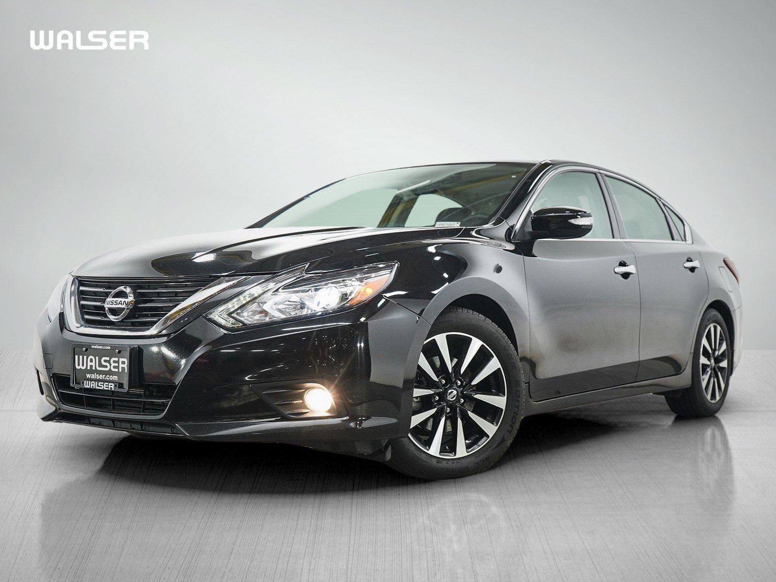 Used 2018 Super Black Clearcoat Nissan 2.5 SL Sedan image 1
