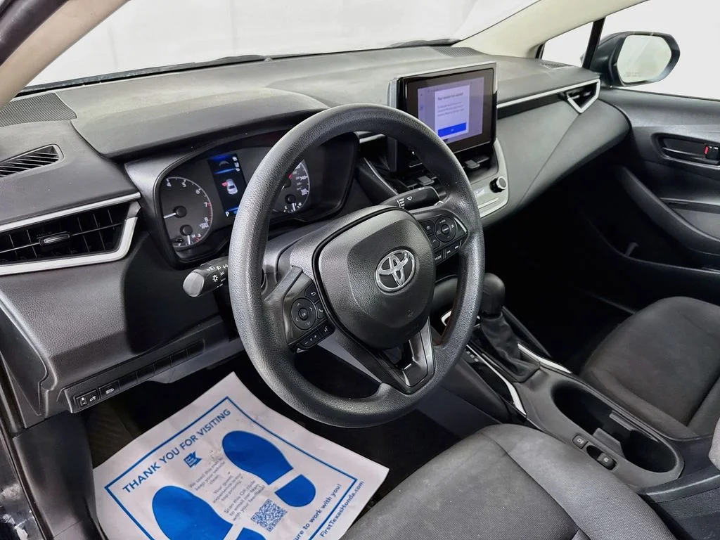 Used 2024 Black Toyota LE image 9