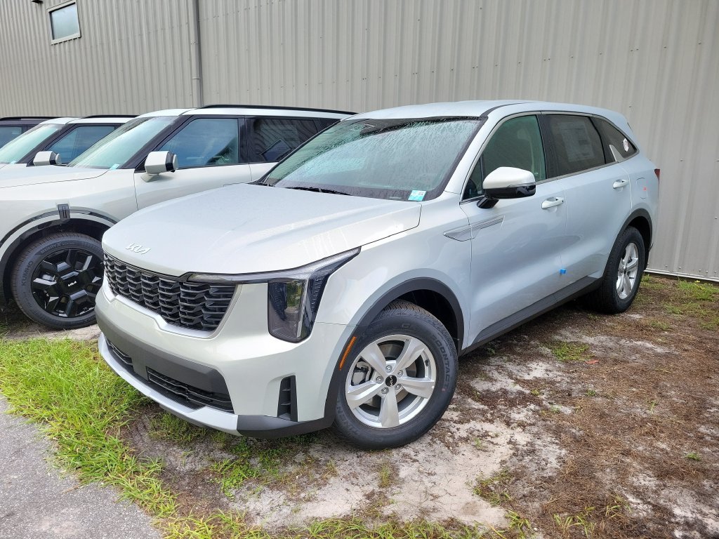 New 2026 Ivory Silver Kia LX image 3