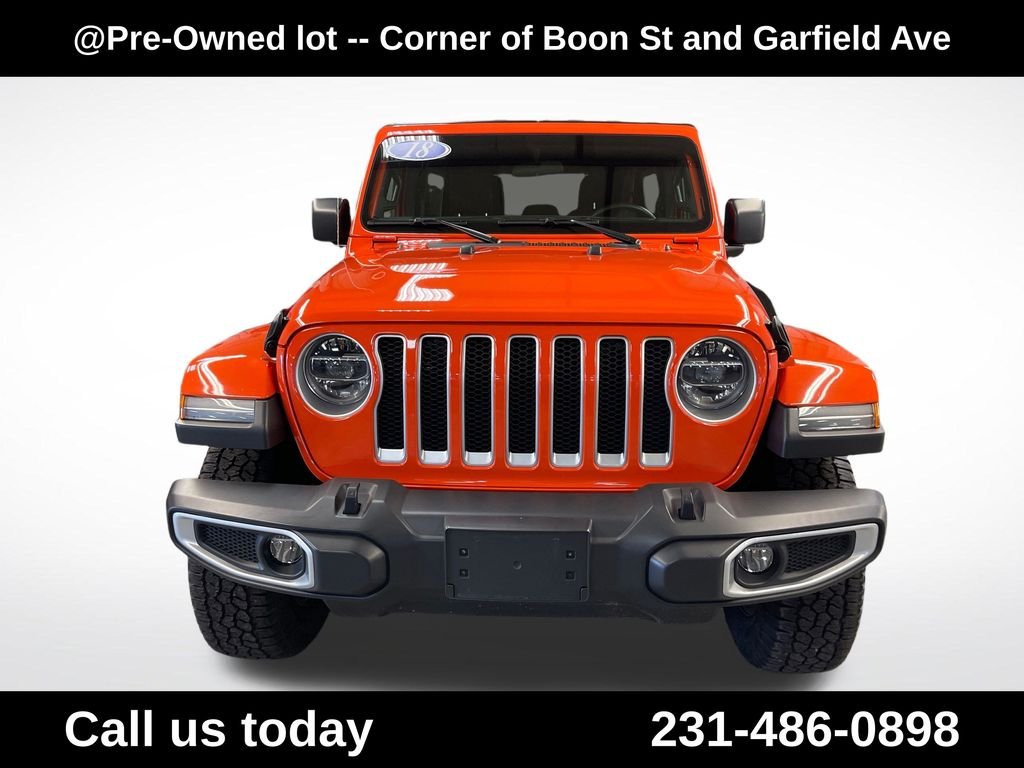 Used 2018 Orange Jeep Unlimited Sahara image 13