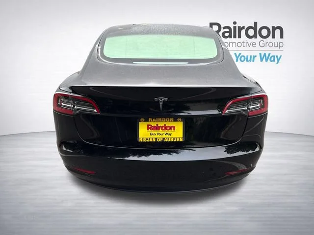 Used 2023 Solid Black Tesla Base image 6