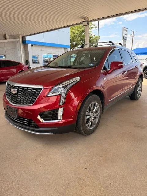 Used 2021 Red Cadillac Premium Luxury image 1