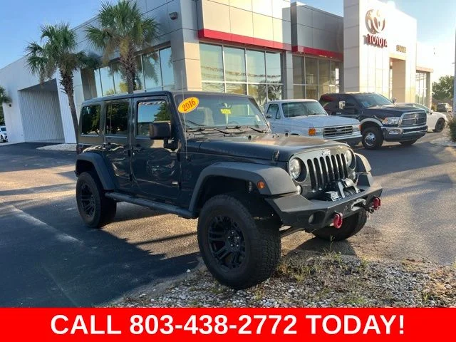 Used 2016 Black Jeep Unlimited Rubicon image 1