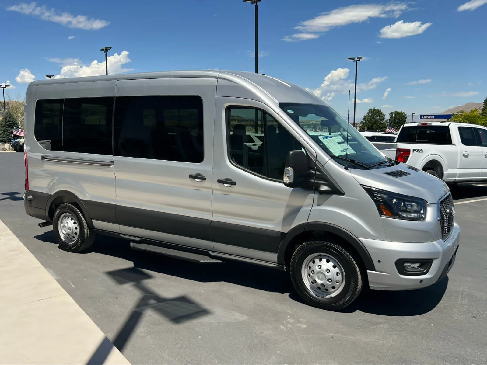New 2026 Ingot Silver Metallic Ford Passenger Van XLT image 5