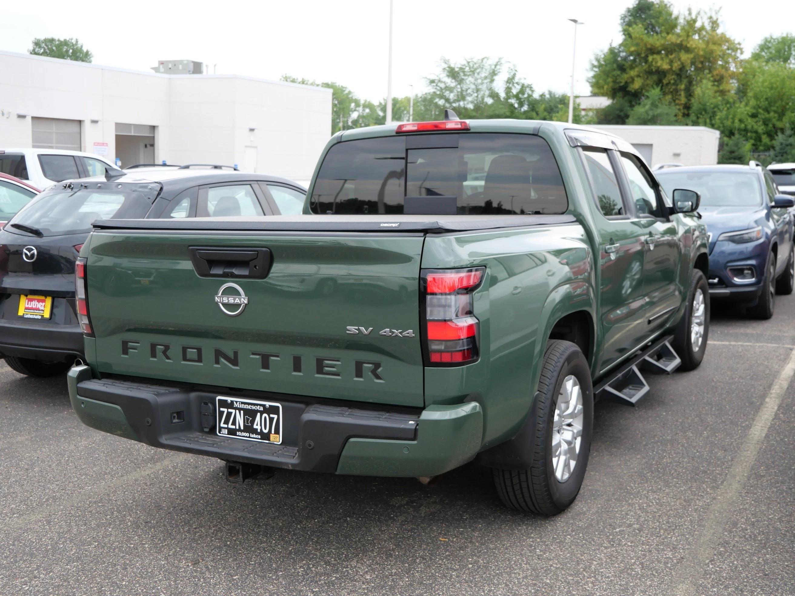 Used 2023 Tactical Green Metallic Nissan SV image 6