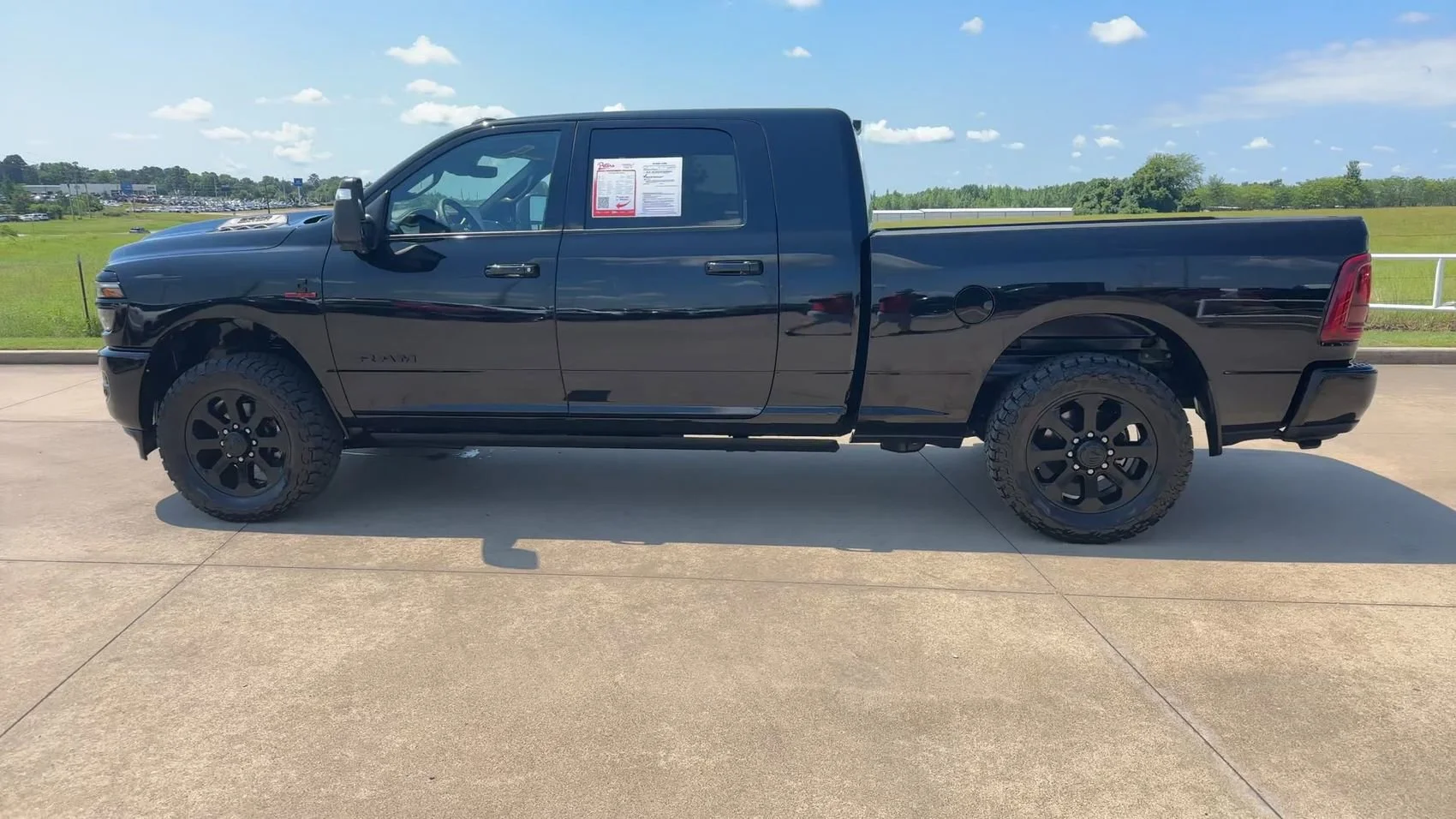 Used 2025 Diamond Black Crystal Pearlcoat Ram Laramie image 4