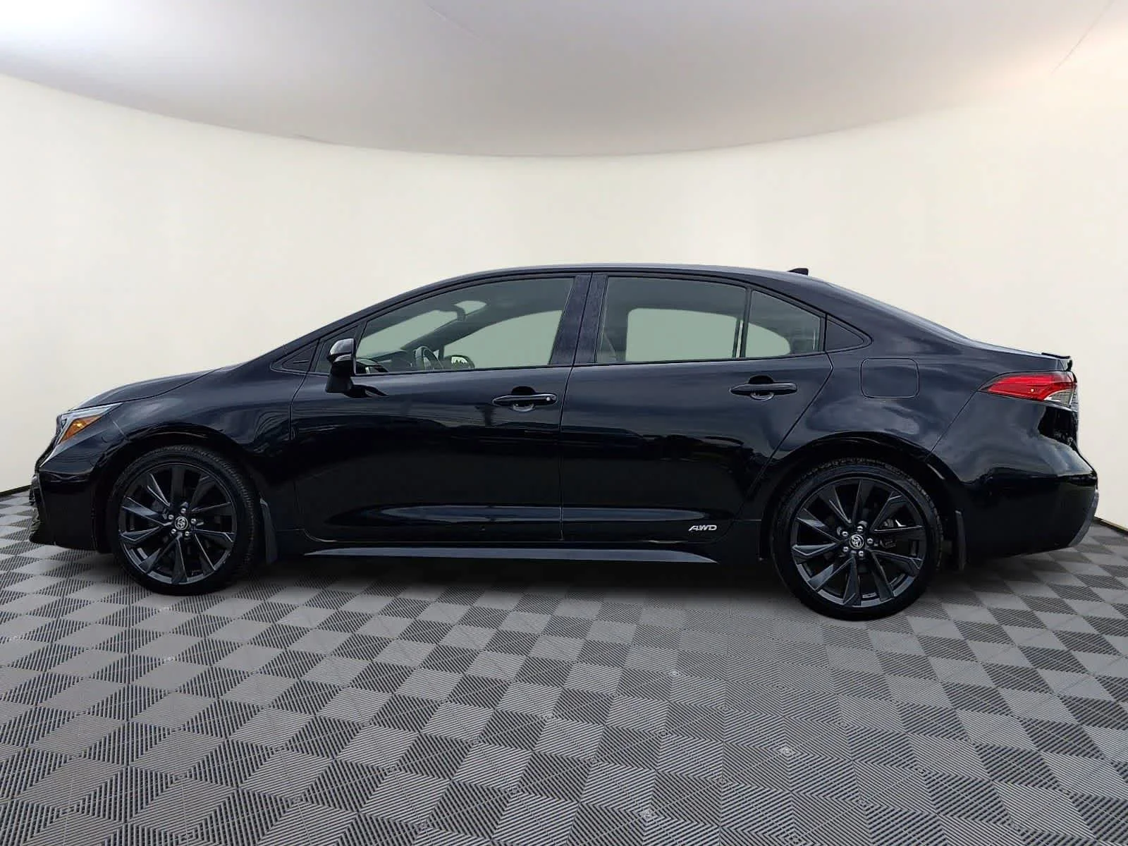 Used 2024 Midnight Black Metallic Toyota Hybrid SE image 10