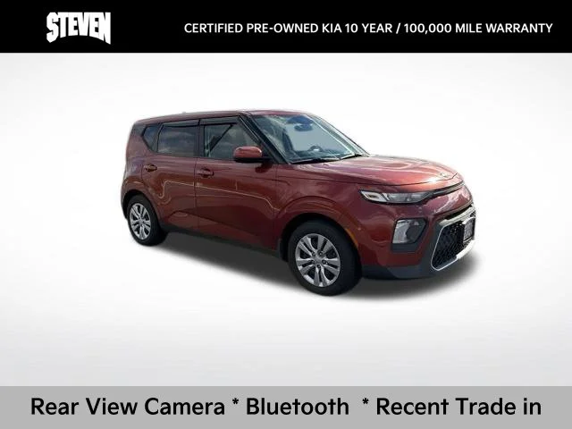 Used 2021 Orange Kia LX image 1