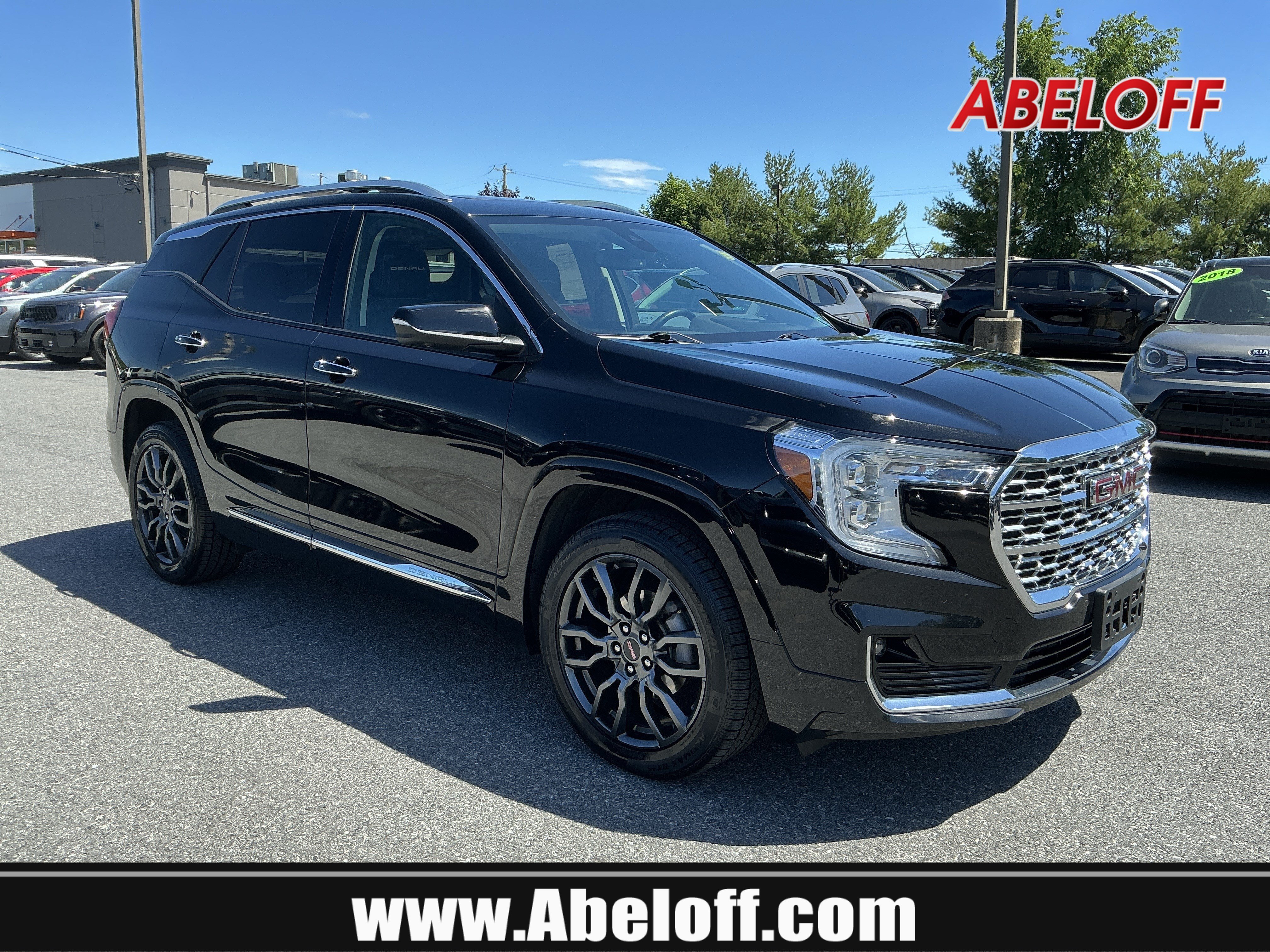 Used 2023 Ebony Twilight Metallic GMC Denali image 1