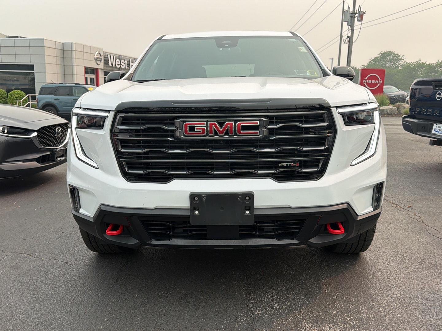 Used 2025 Summit White GMC AWD AT4 image 2