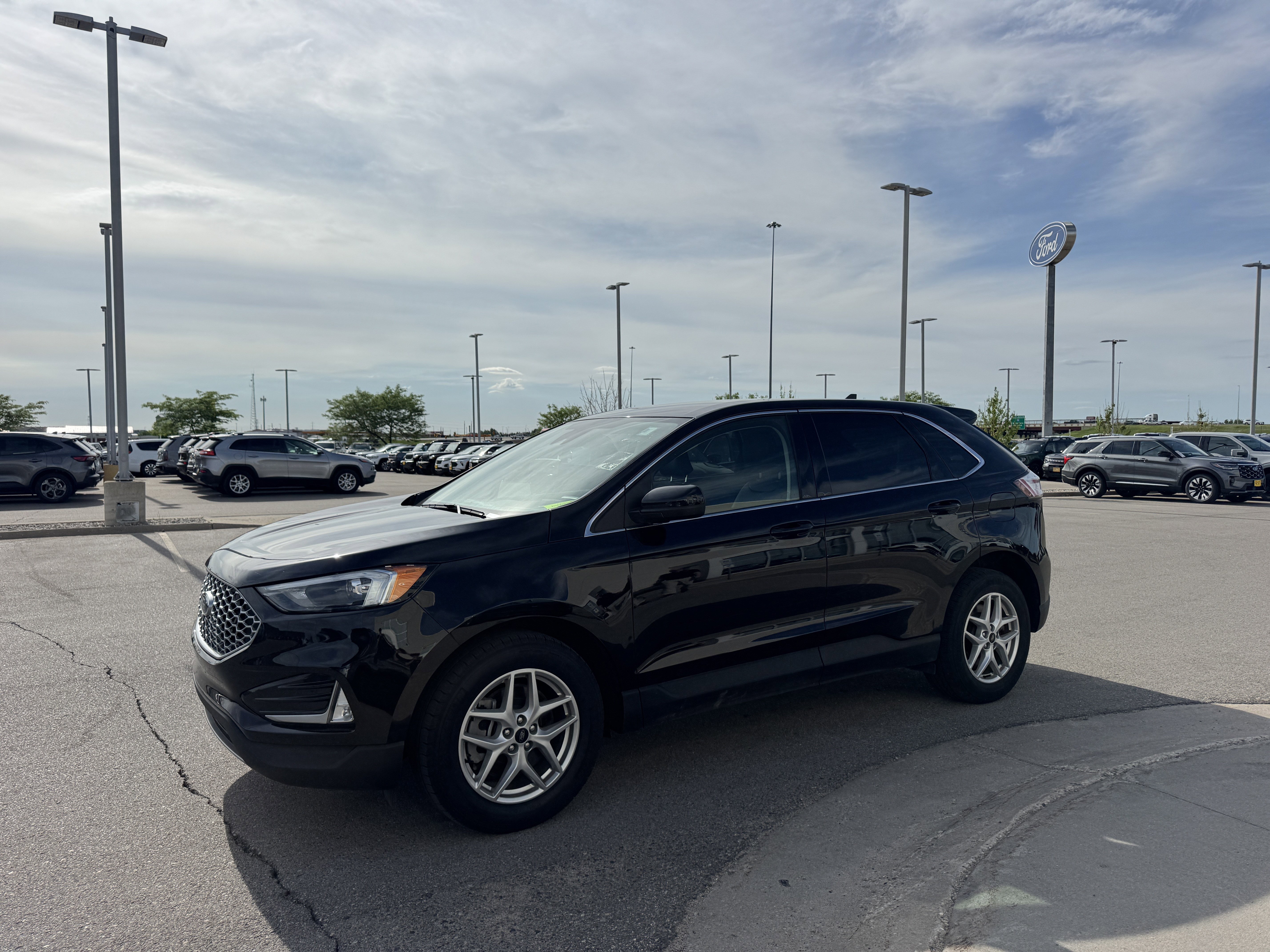 Certified Used 2024 Agate Black Metallic Ford SEL image 2