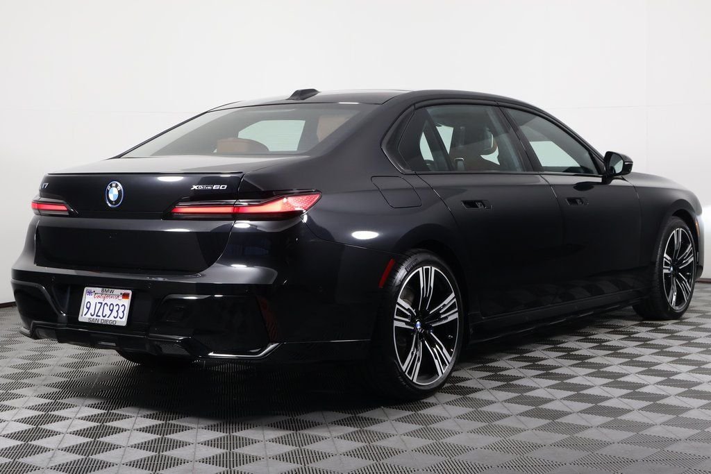 Certified Used 2024 Black Sapphire Metallic BMW xDrive60 image 4
