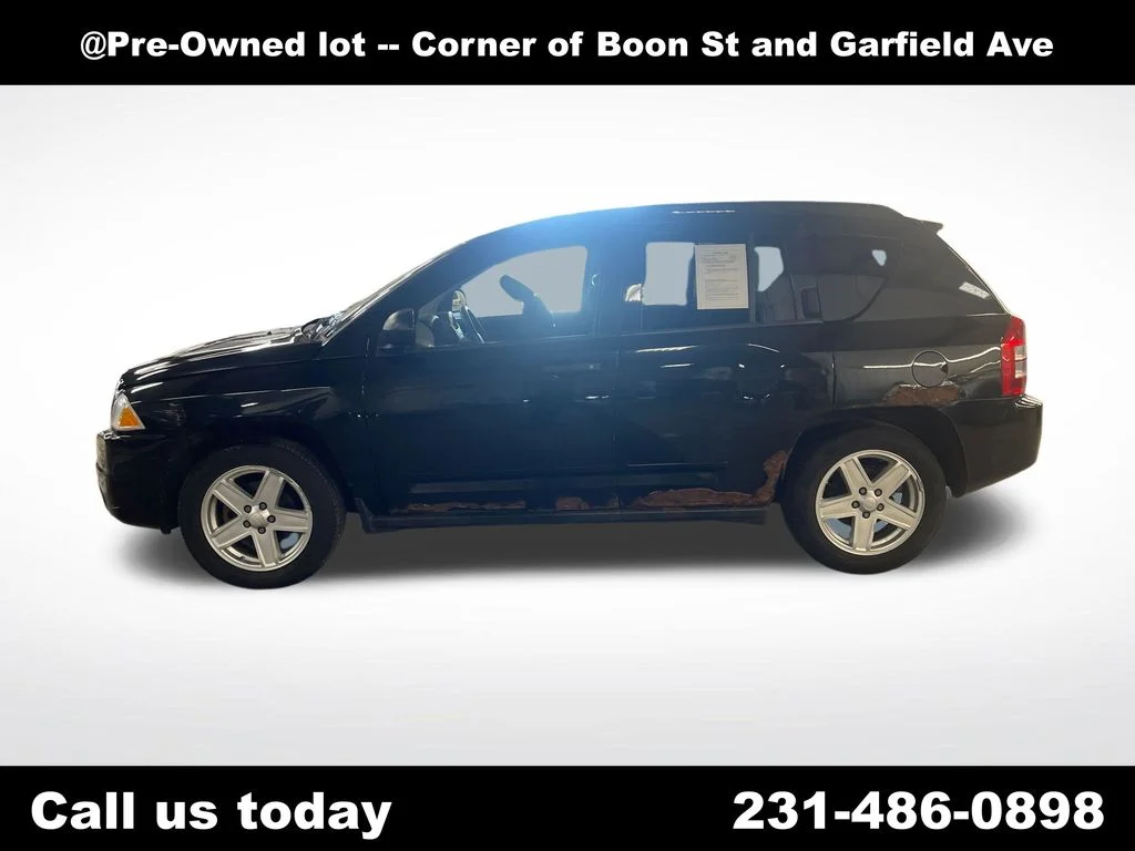 Used 2009 Black Jeep Sport image 2