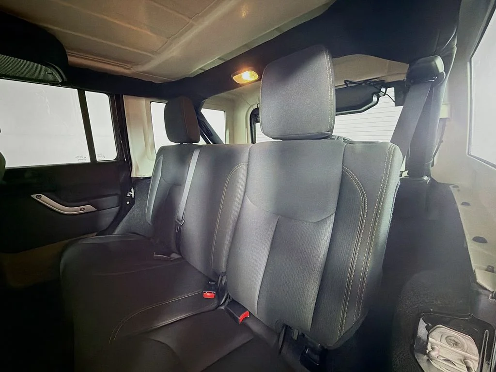 Used 2015 Black Jeep Unlimited Sahara image 18