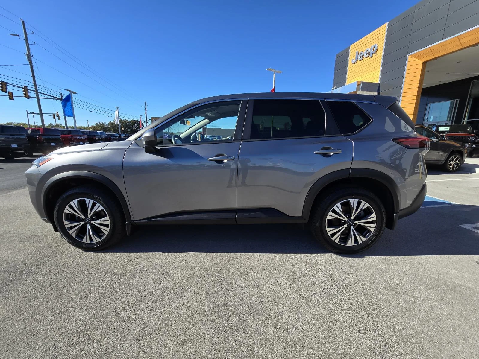 Used 2023 Gun Metallic Nissan SV image 4