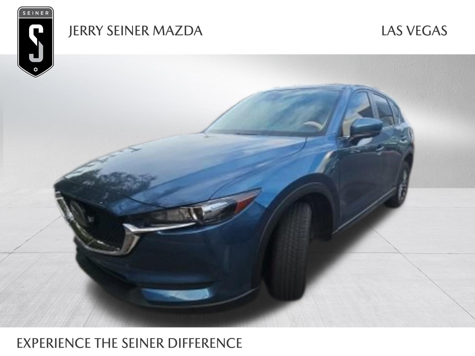 Used 2021 Eternal Blue Mica Mazda Sport image 1