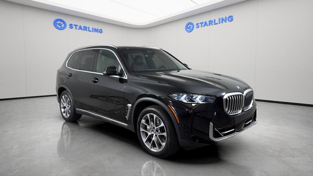 Used 2025 Black BMW xDrive50e image 13
