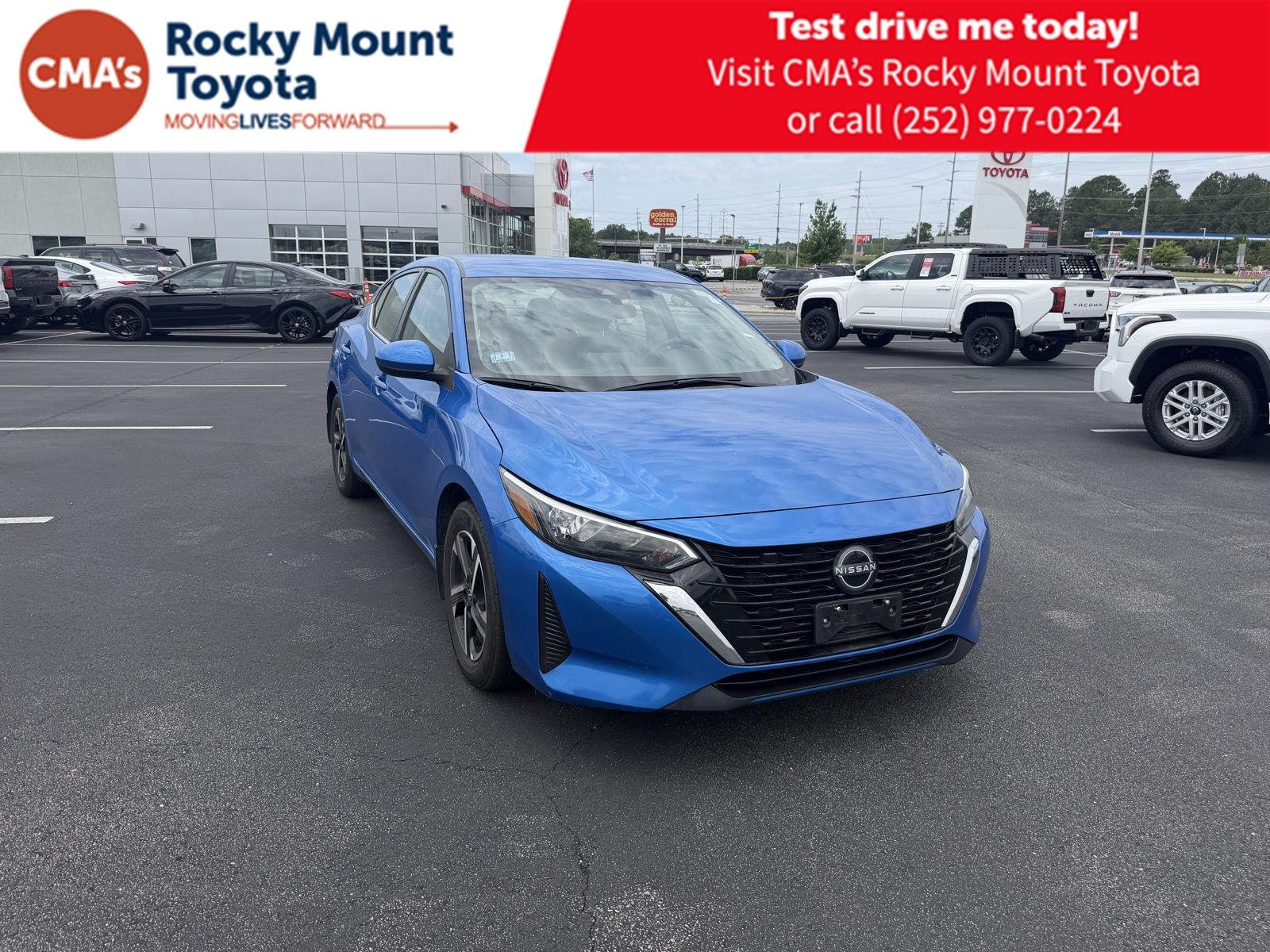 Used 2025 Electric Blue Metallic Nissan SV image 1