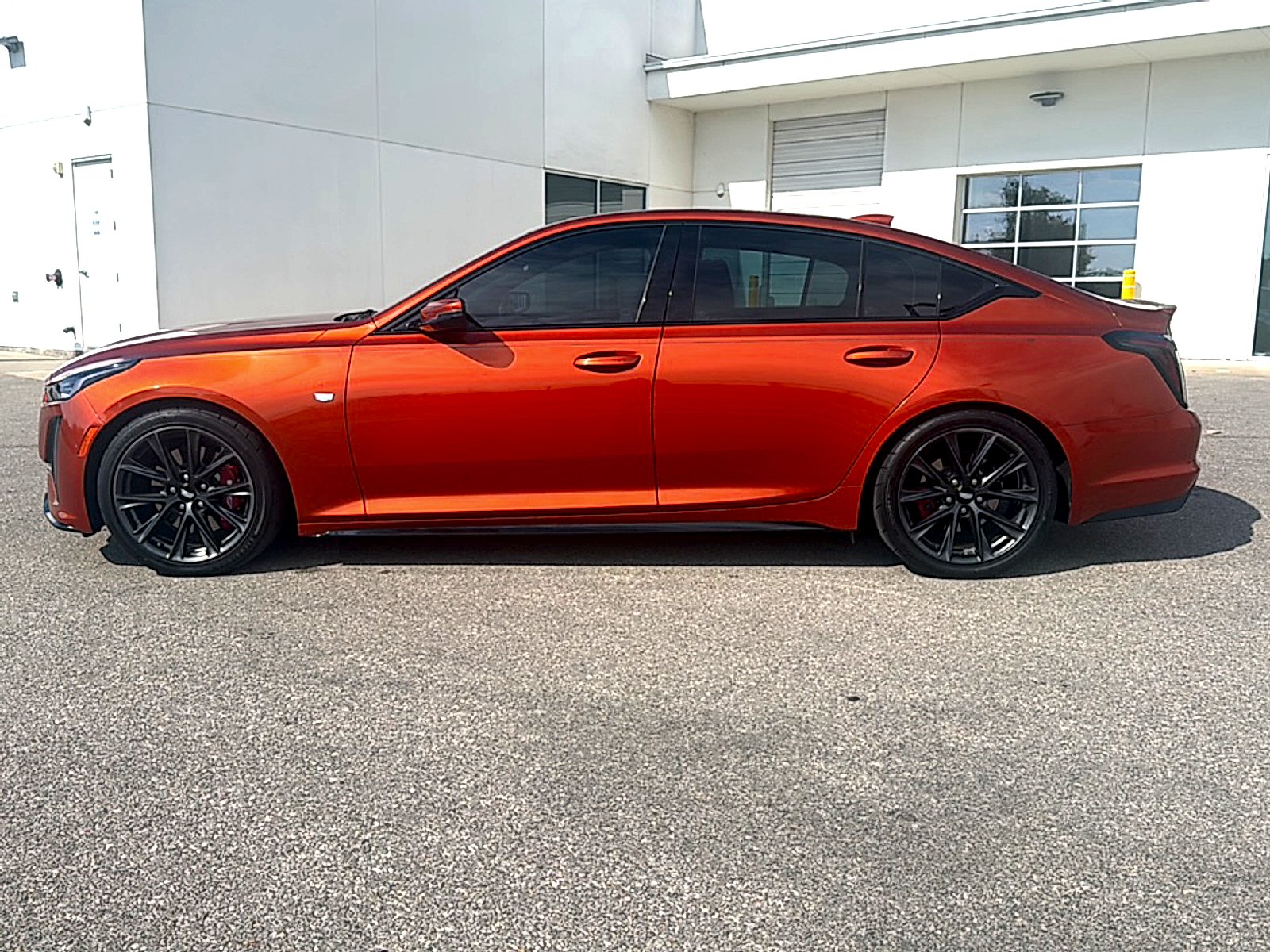 Used 2022 Blaze Orange Metallic Cadillac Sport image 4