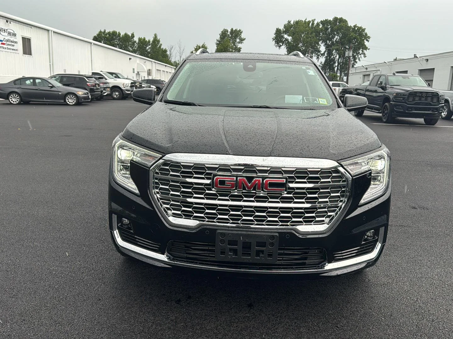 Used 2024 Ebony Twilight Metallic GMC Denali image 6