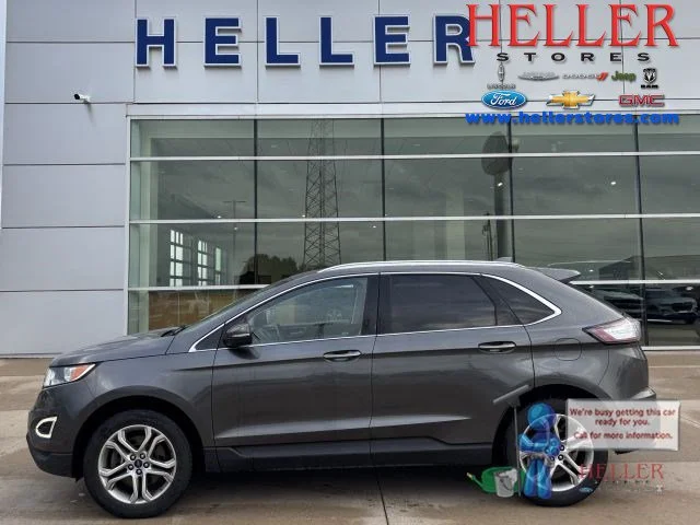 Used 2016 Magnetic Metallic Ford Titanium image 1