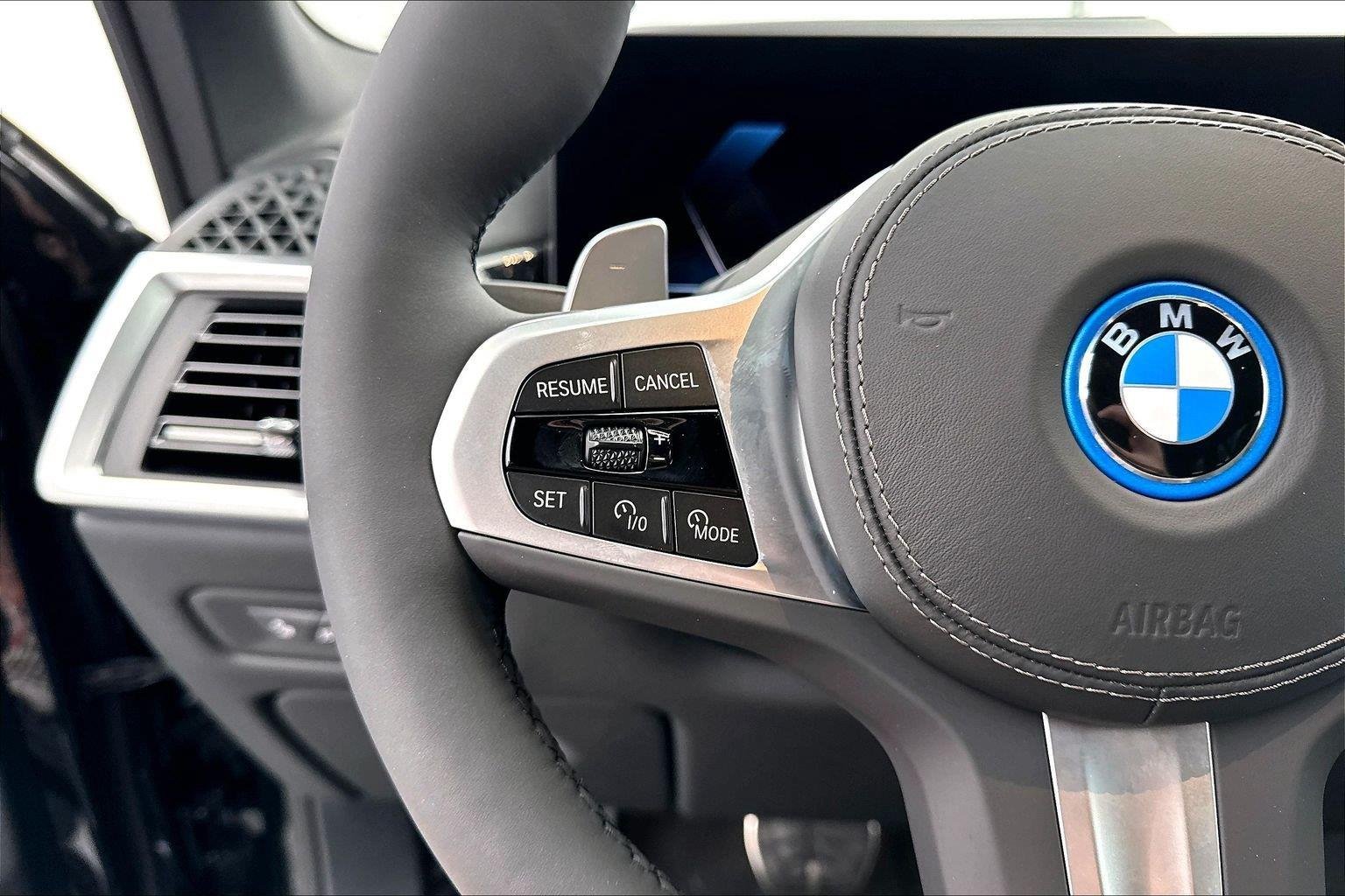 New 2026 Black Sapphire Metallic BMW xDrive50e image 15