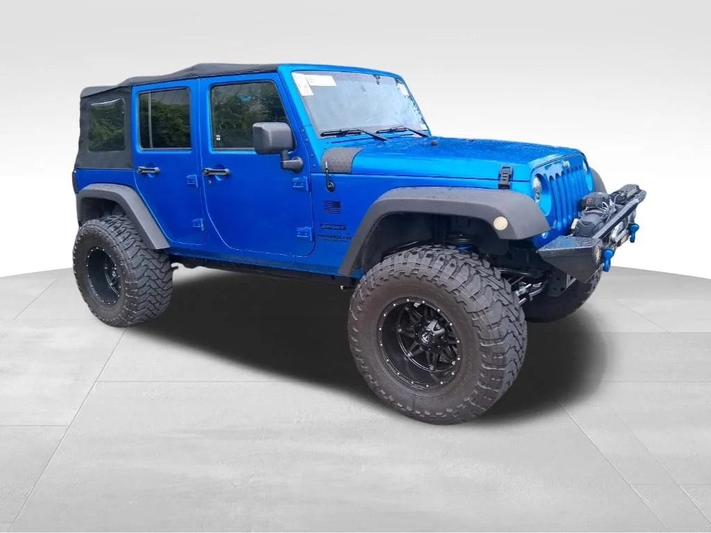 Used 2015 Blue Jeep Unlimited Sport image 3