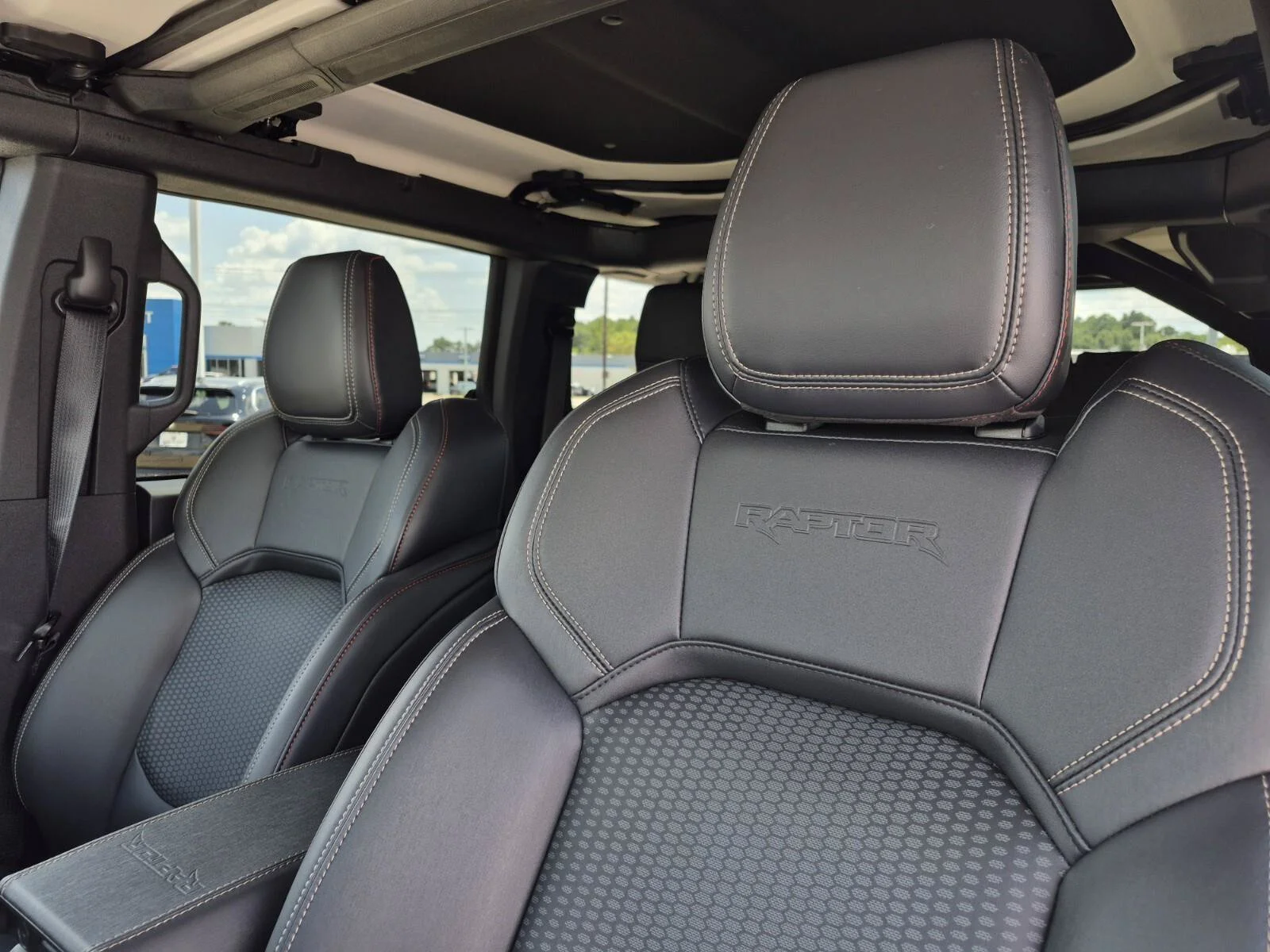 Used 2025 Shelter Green Metallic Ford Raptor image 14