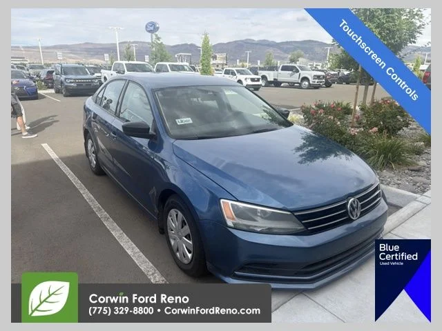 Used 2015 Blue Metallic Volkswagen 2.0L S image 1