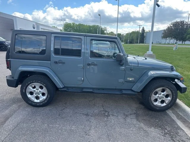Used 2014 Jeep Wrangler Unlimited Sahara with VIN 1C4BJWEGXEL230097 for sale in White Bear Lake, Minnesota