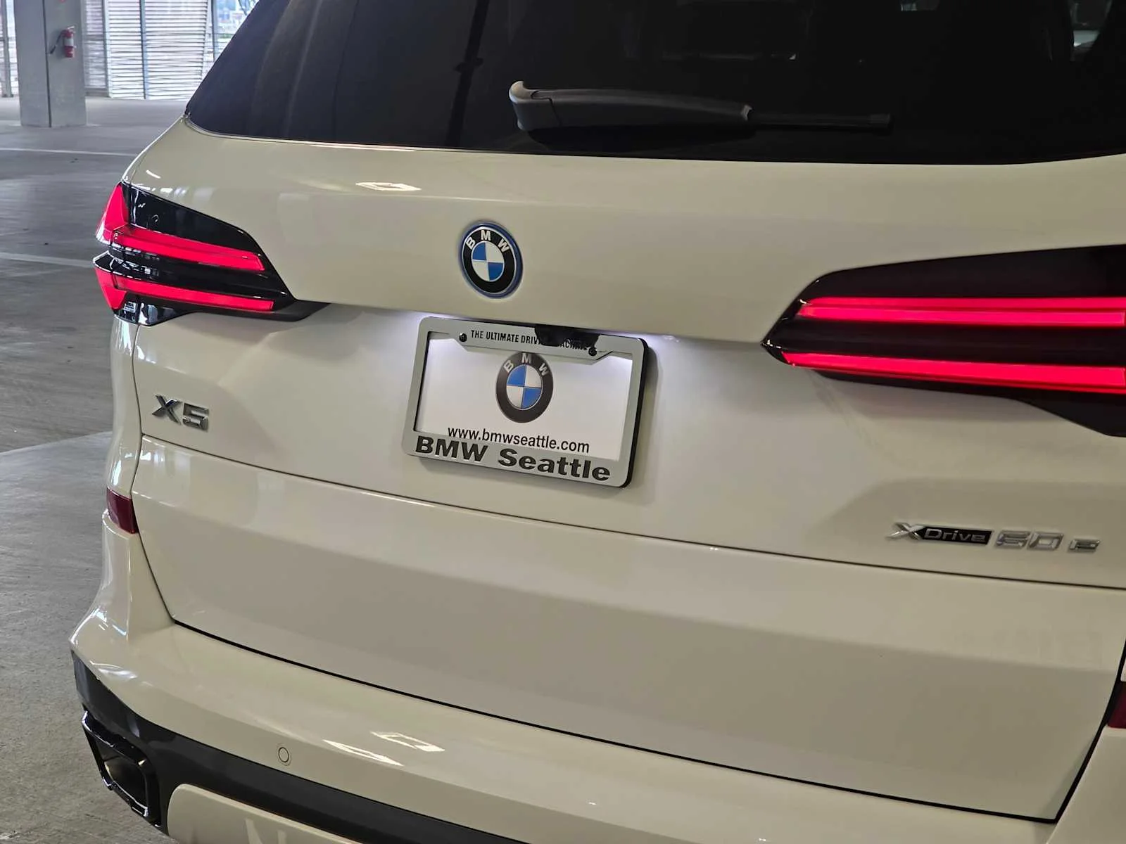New 2026 Alpine White BMW xDrive50e image 7