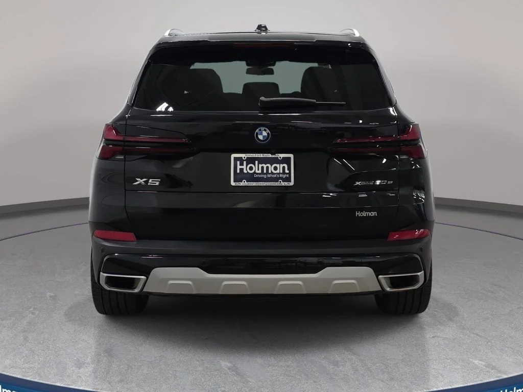 Used 2025 Black Sapphire Metallic BMW xDrive50e image 7
