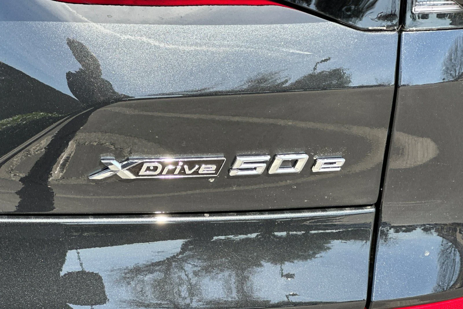 New 2026 Black Sapphire Metallic BMW xDrive50e image 6
