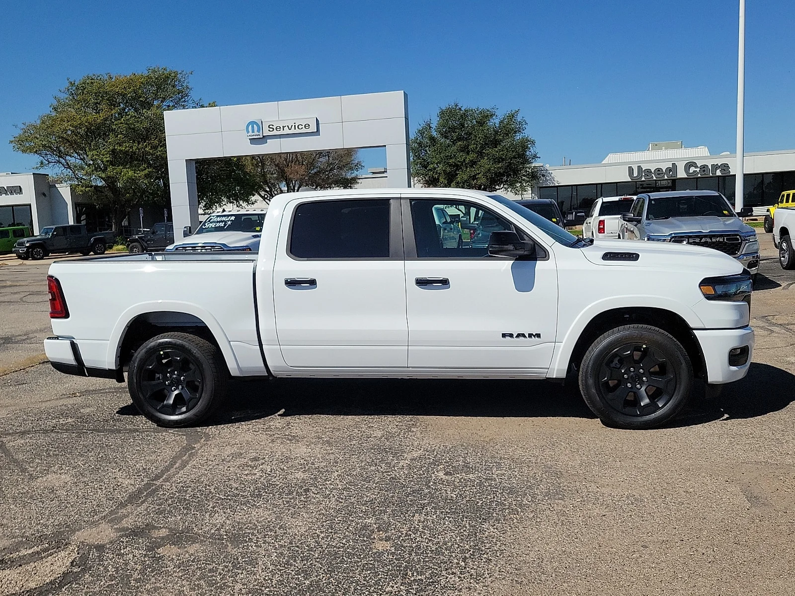 New 2027 Bright White Ram LONE STAR CREW CAB 4X4 5