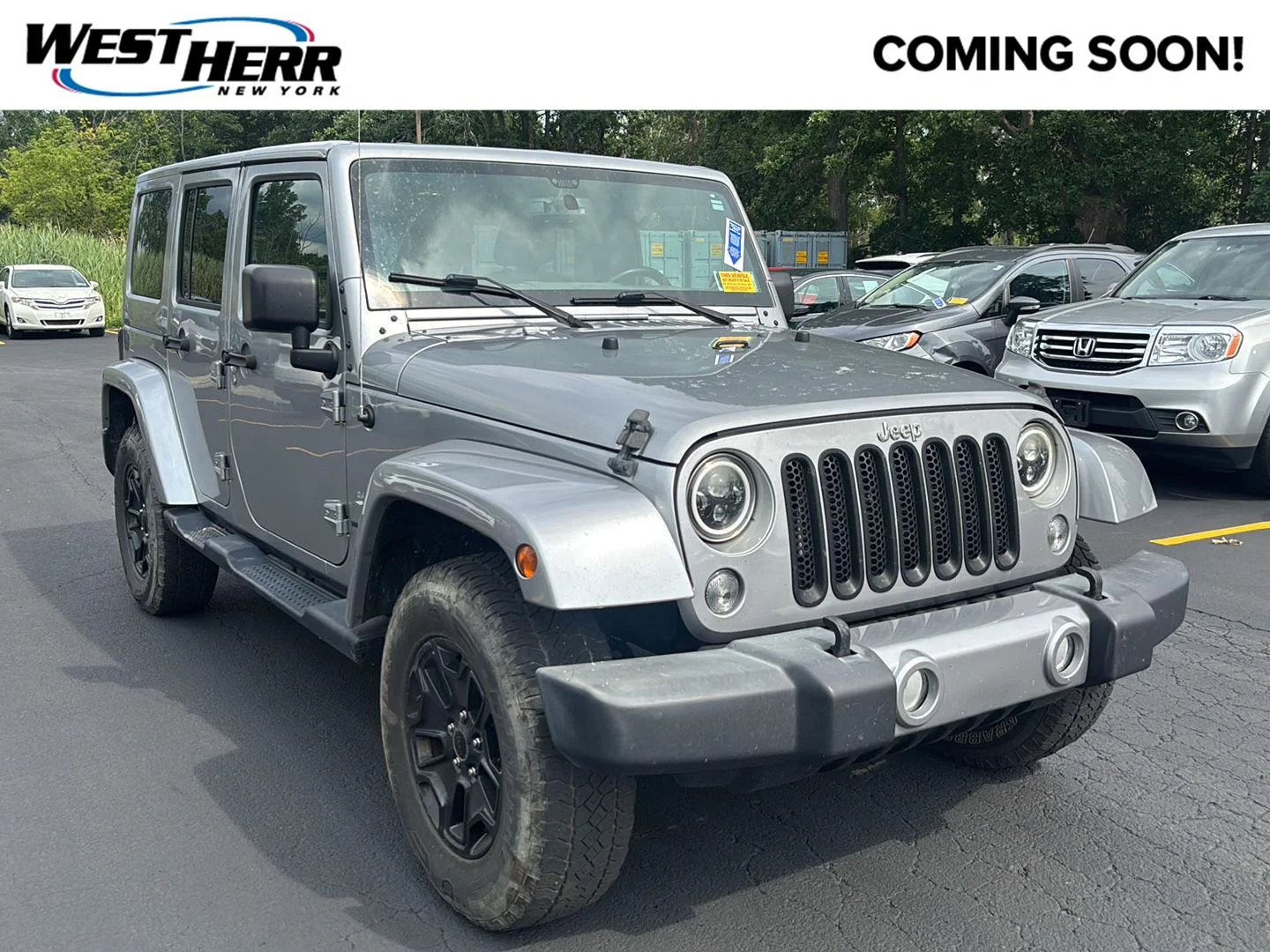 Used 2018 Billet Metallic Jeep Sahara image 1