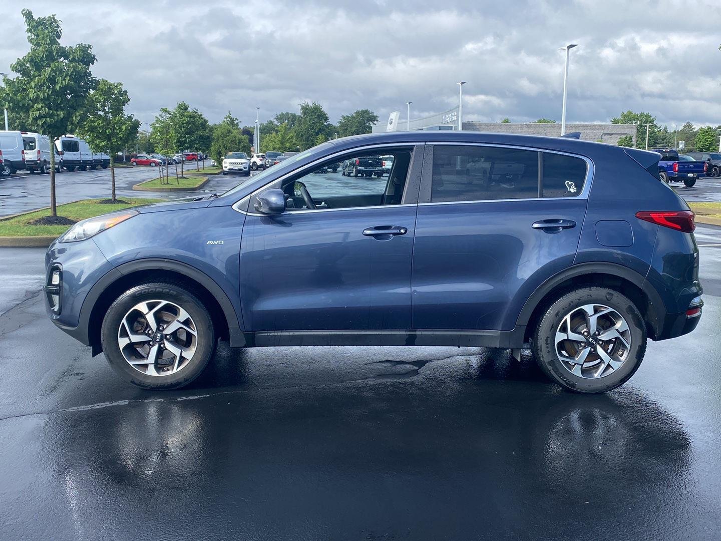 Used 2022 Pacific Blue Kia LX image 7