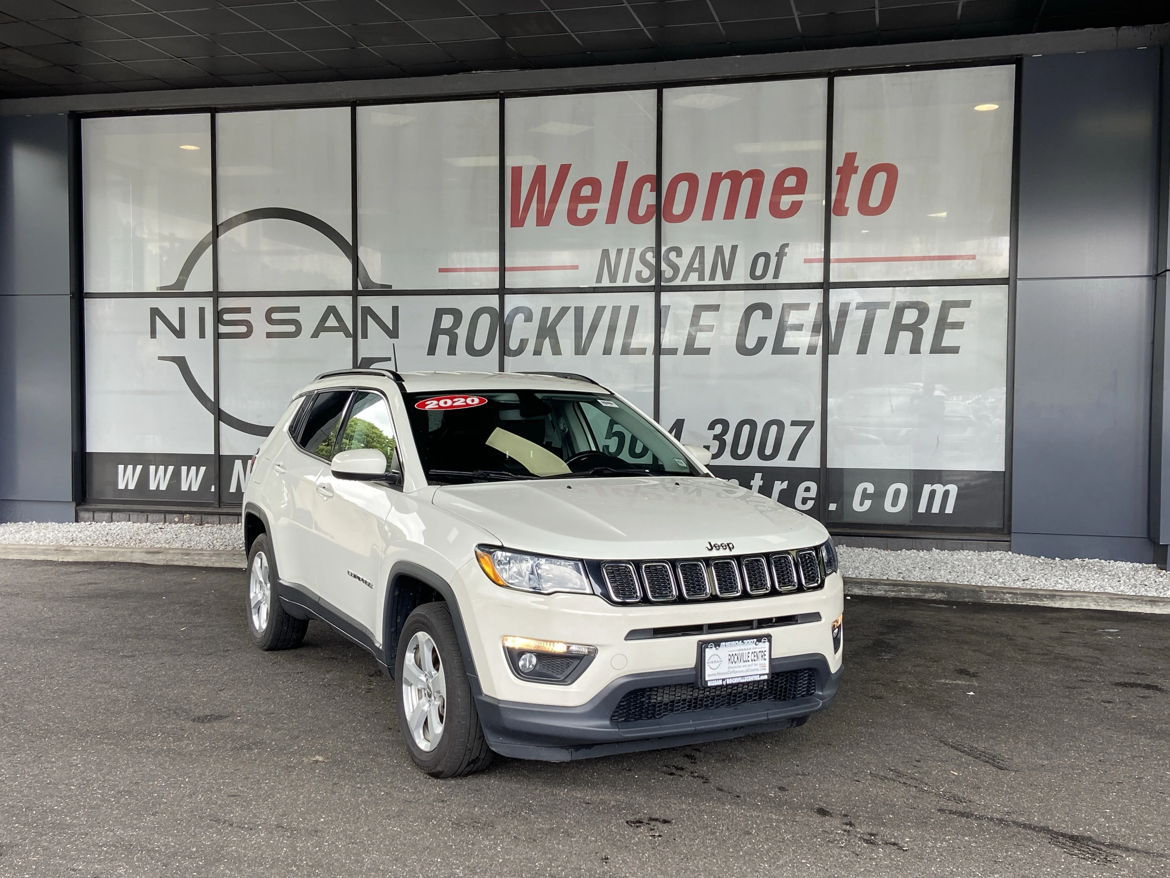Used 2020 White Clearcoat Jeep Latitude image 1