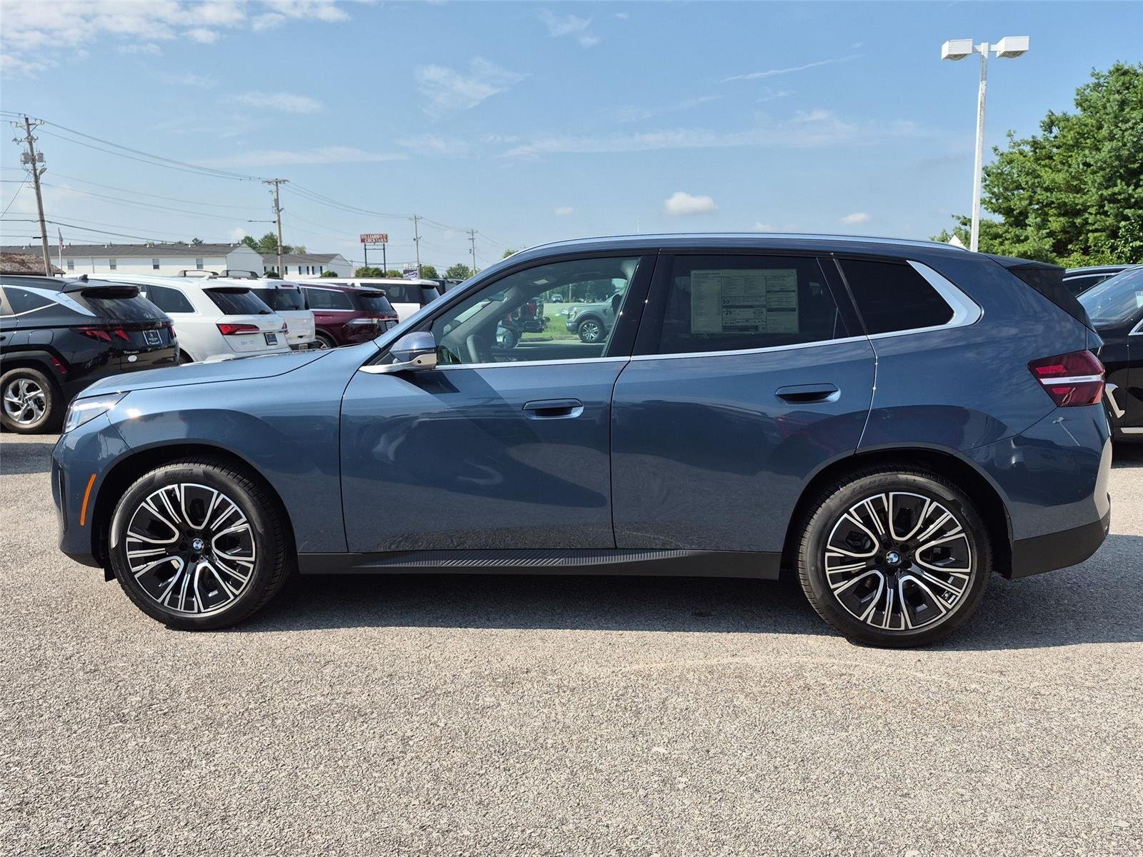 New 2026 Arctic Race Blue metallic BMW 30 xDrive image 2