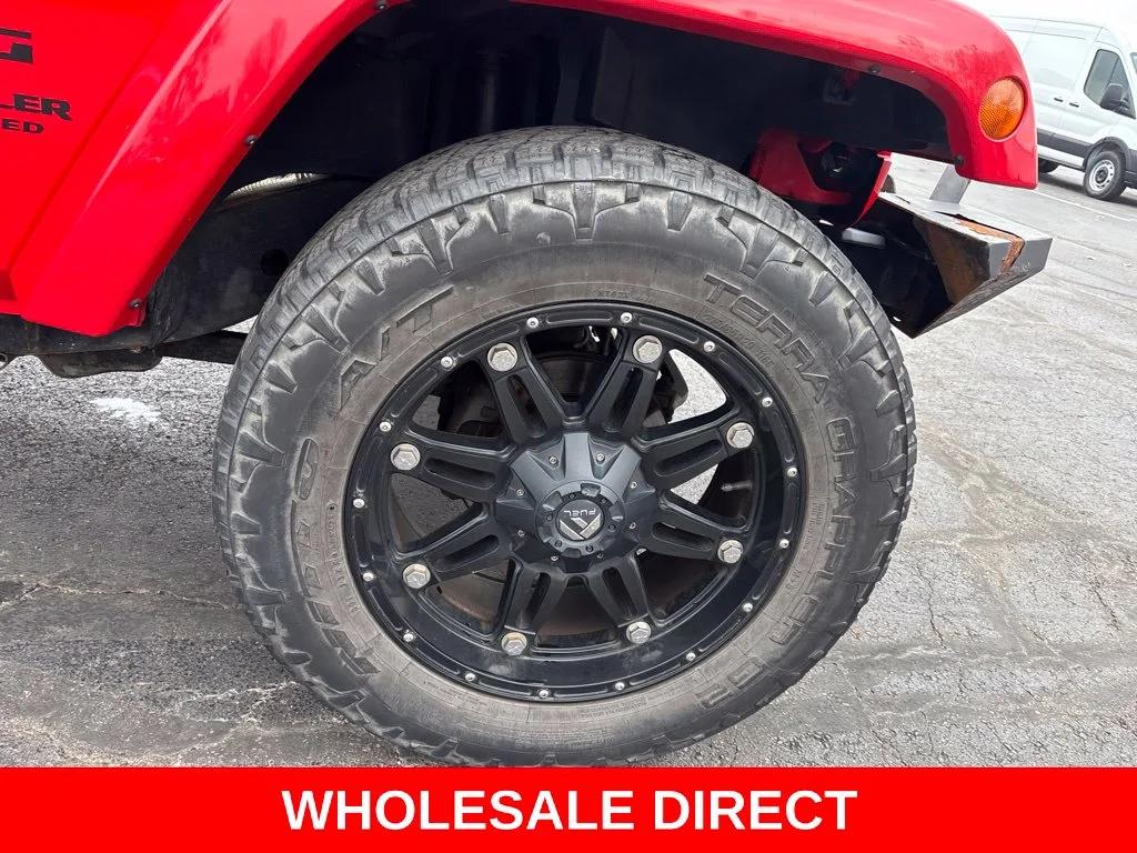 Used 2015 Red Jeep Unlimited Sport image 12